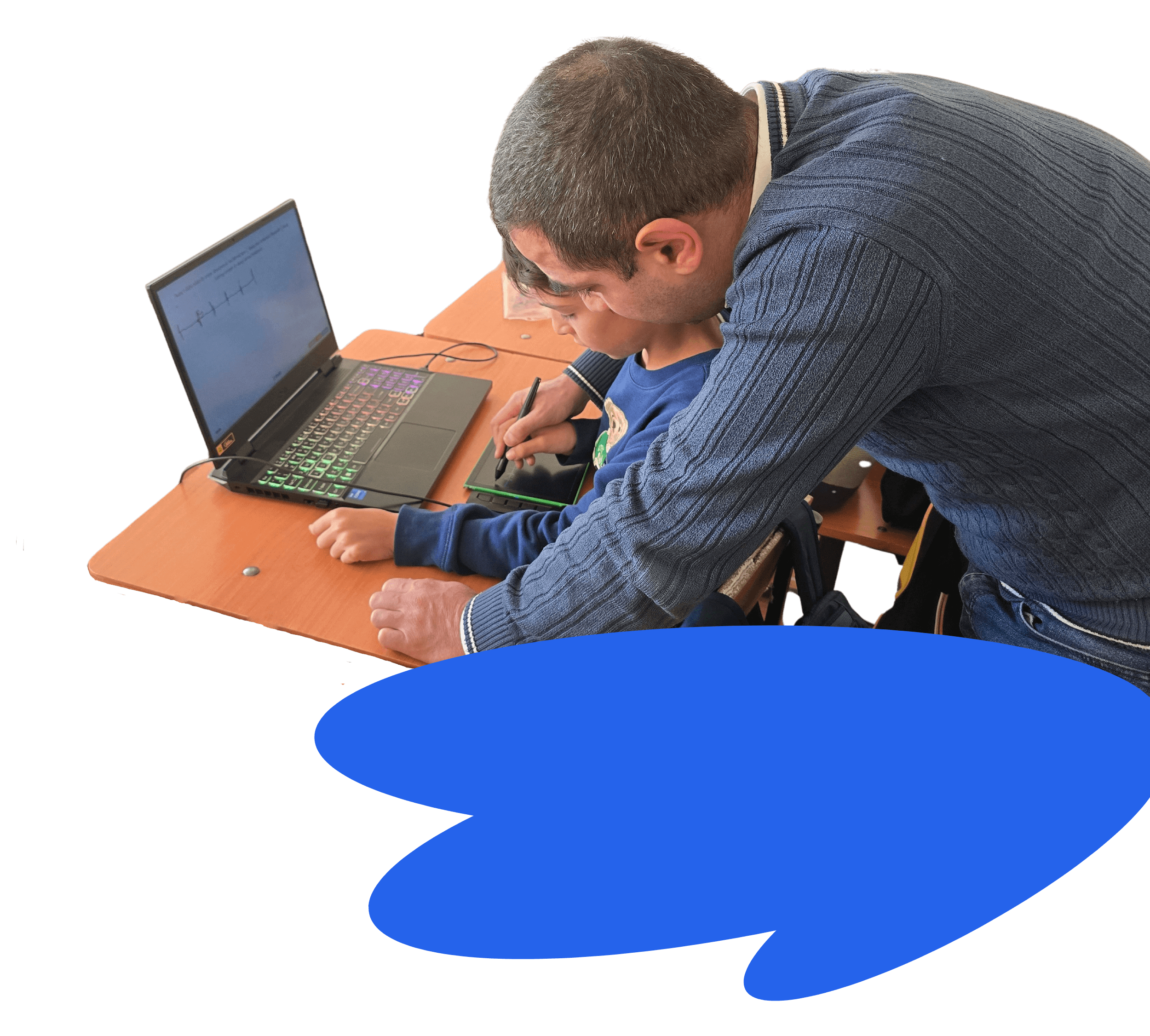 A teacher helping a student use thelo on a computer and tablet